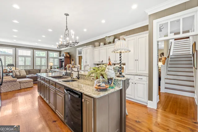 a bathroom with a sink and a large mirror