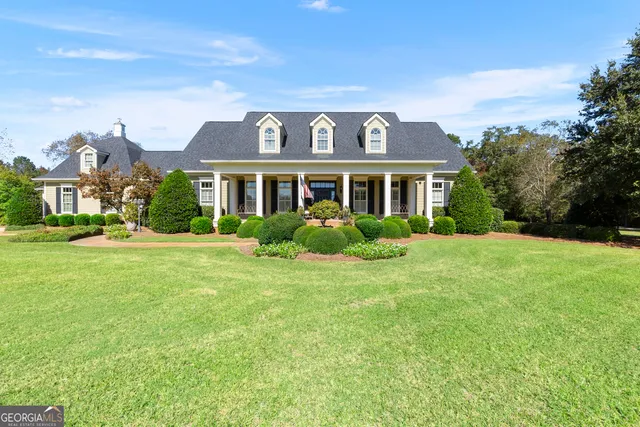 a view of entryway dining room and hall with wooden floor