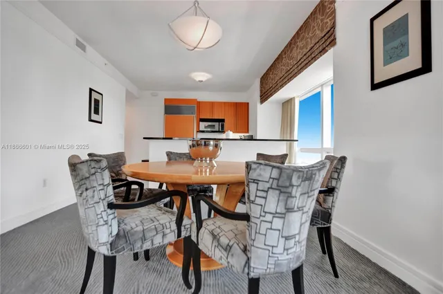 a view of a dining room with furniture