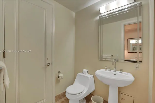 a bathroom with a sink and a toilet