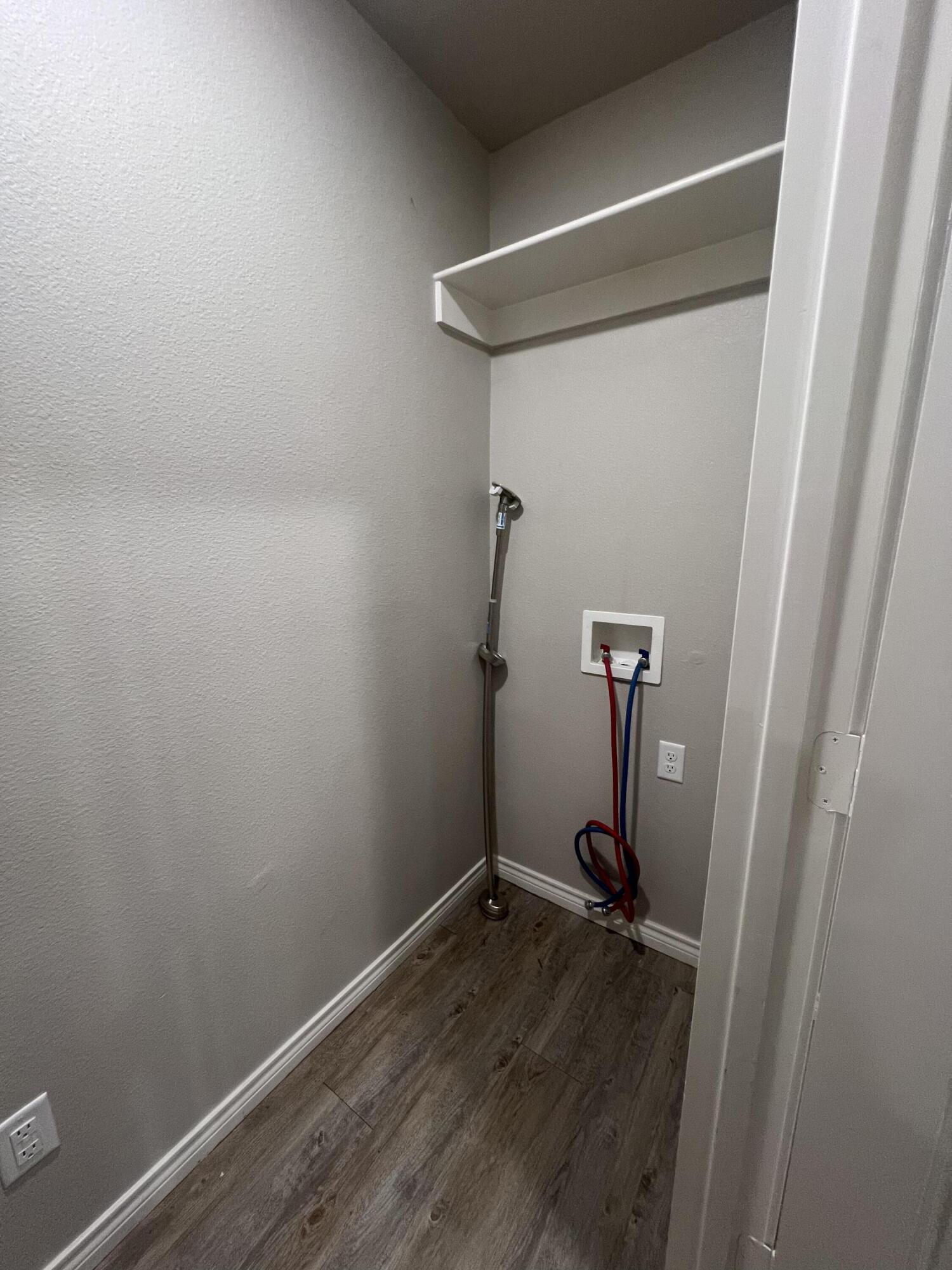 2632 Hickory Avenue Lubbock, TX 79404 - Photo 10 of 11 a view of a room with wooden floor