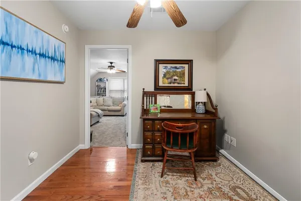 a room with furniture and a rug