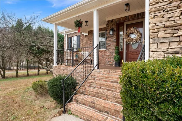 a view of a house with a porch