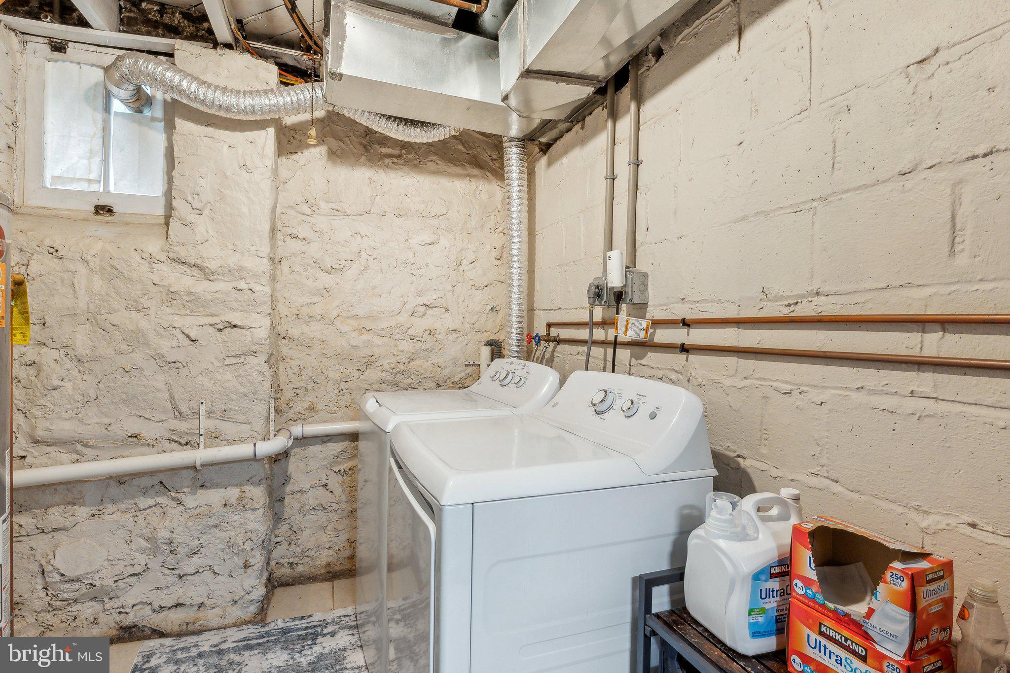 5207 Eugene Avenue Baltimore, MD 21206 - Photo 27 of 36 a utility room with dryer and washer