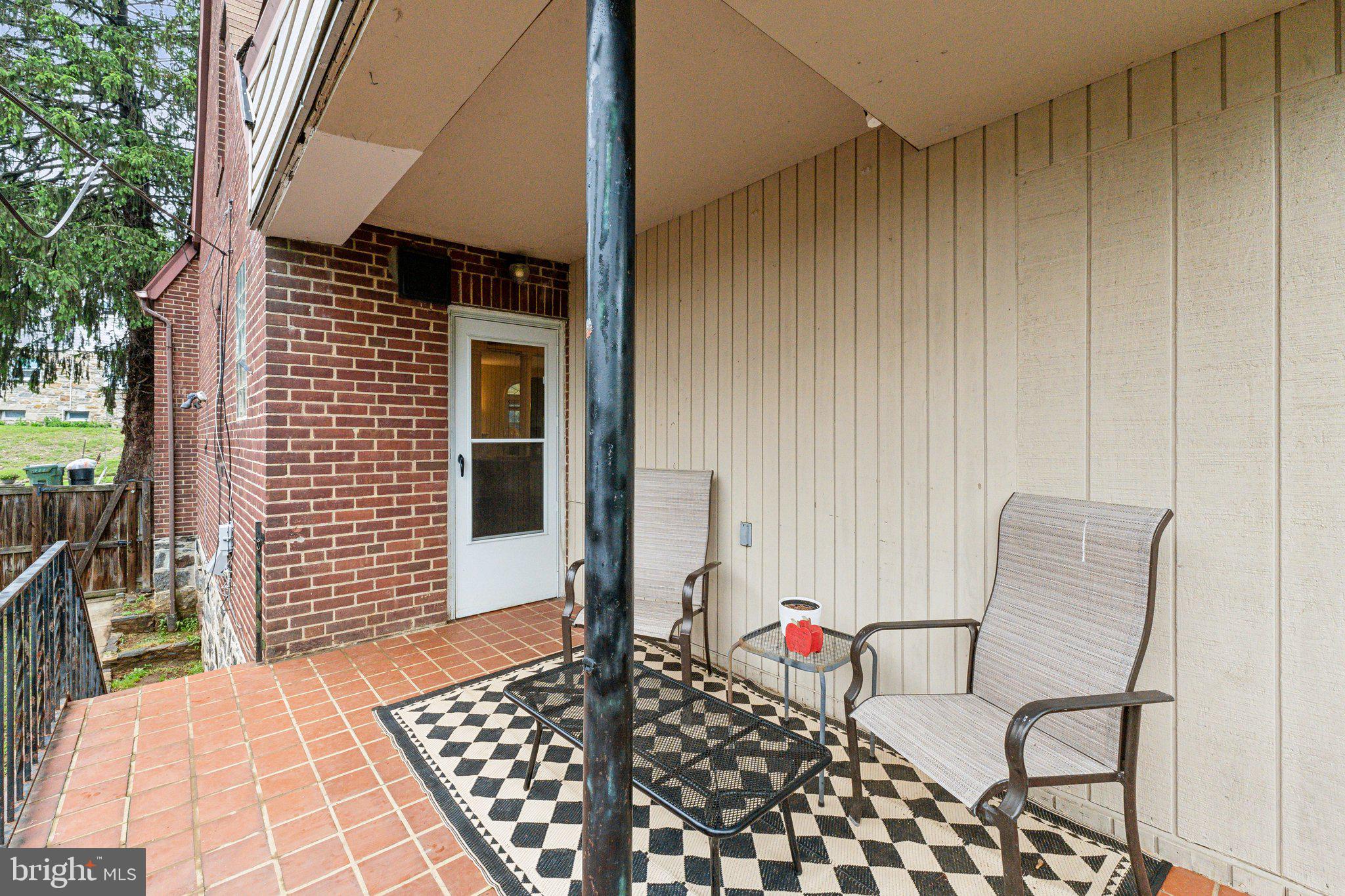 5207 Eugene Avenue Baltimore, MD 21206 - Photo 29 of 36 a view of a two chairs in the balcony