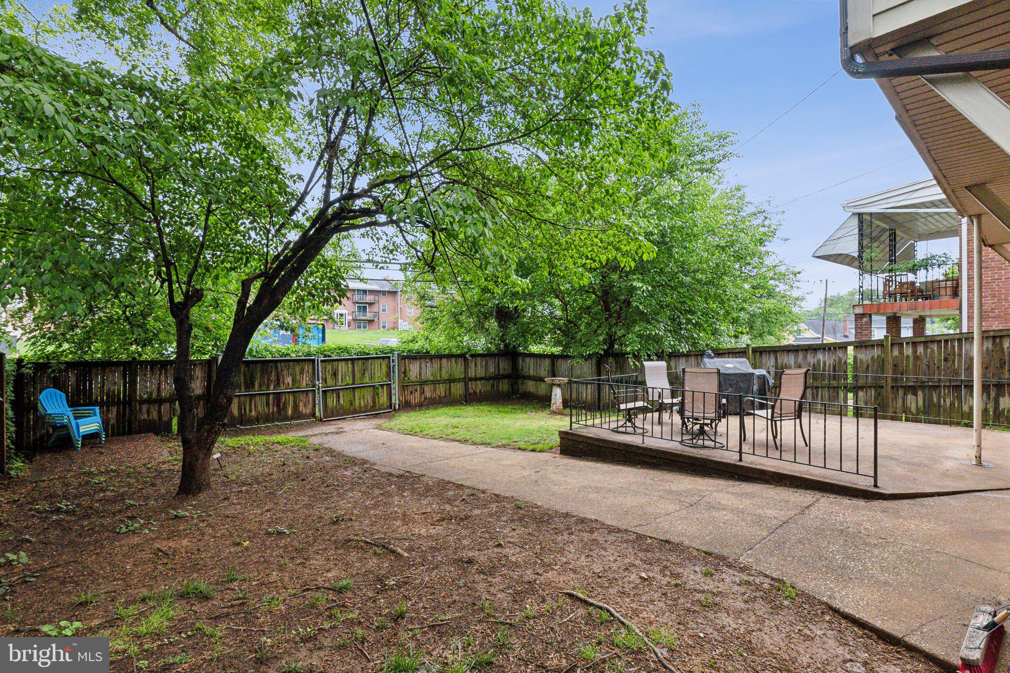 5207 Eugene Avenue Baltimore, MD 21206 - Photo 31 of 36 a view of outdoor space with deck and trees