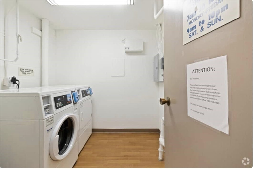 200 Bedford Road, Unit 9E Woburn, MA 01801 - Photo 7 of 14 a utility room with dryer and washer