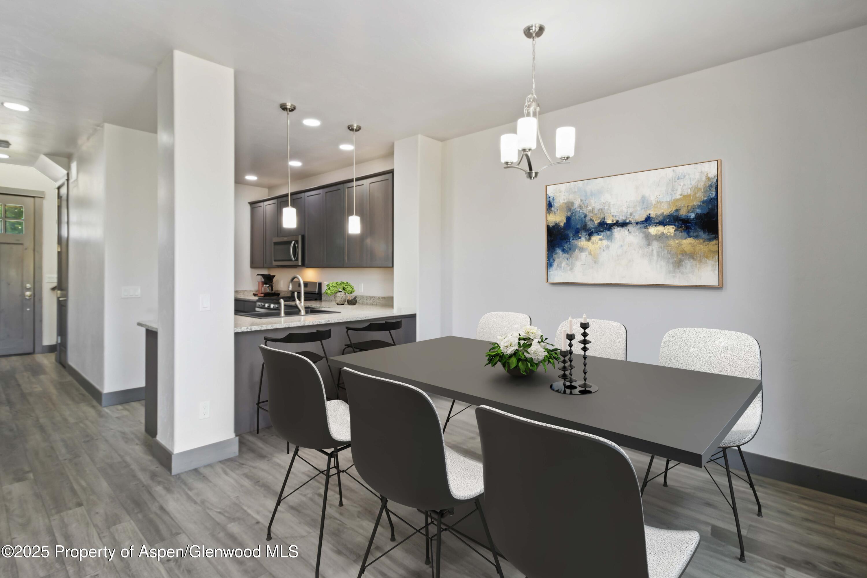 123 Redstone Drive New Castle, CO 81647 - Photo 18 of 34 a dining room with furniture and window