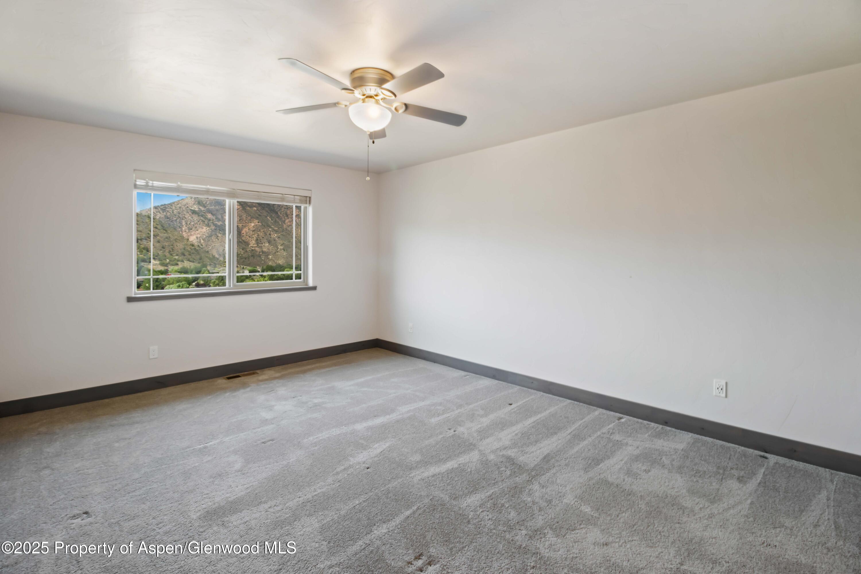 123 Redstone Drive New Castle, CO 81647 - Photo 30 of 34 an empty room with a window
