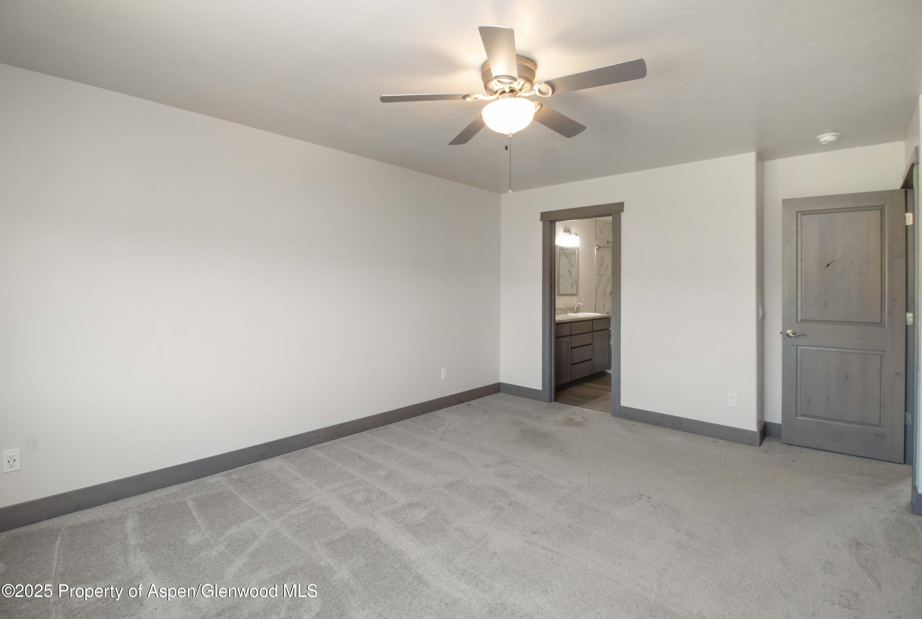 123 Redstone Drive New Castle, CO 81647 - Photo 31 of 34 an empty room with a bathroom