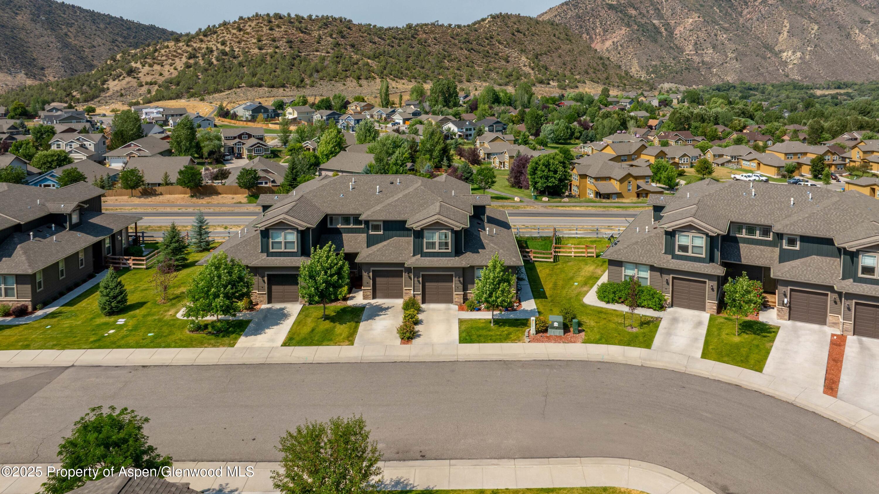 123 Redstone Drive New Castle, CO 81647 - Photo 4 of 34 an aerial view of residential houses with outdoor space and parking