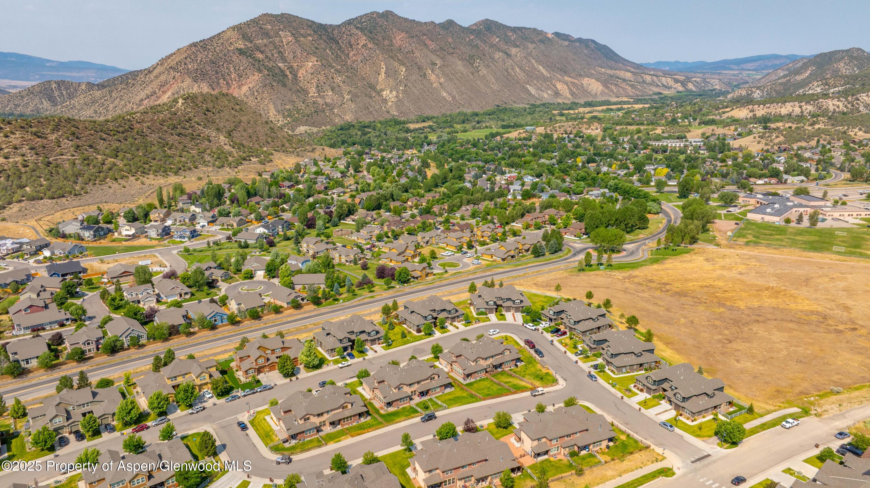 123 Redstone Drive New Castle, CO 81647 - Photo 9 of 34 a view of a yard with a mountain