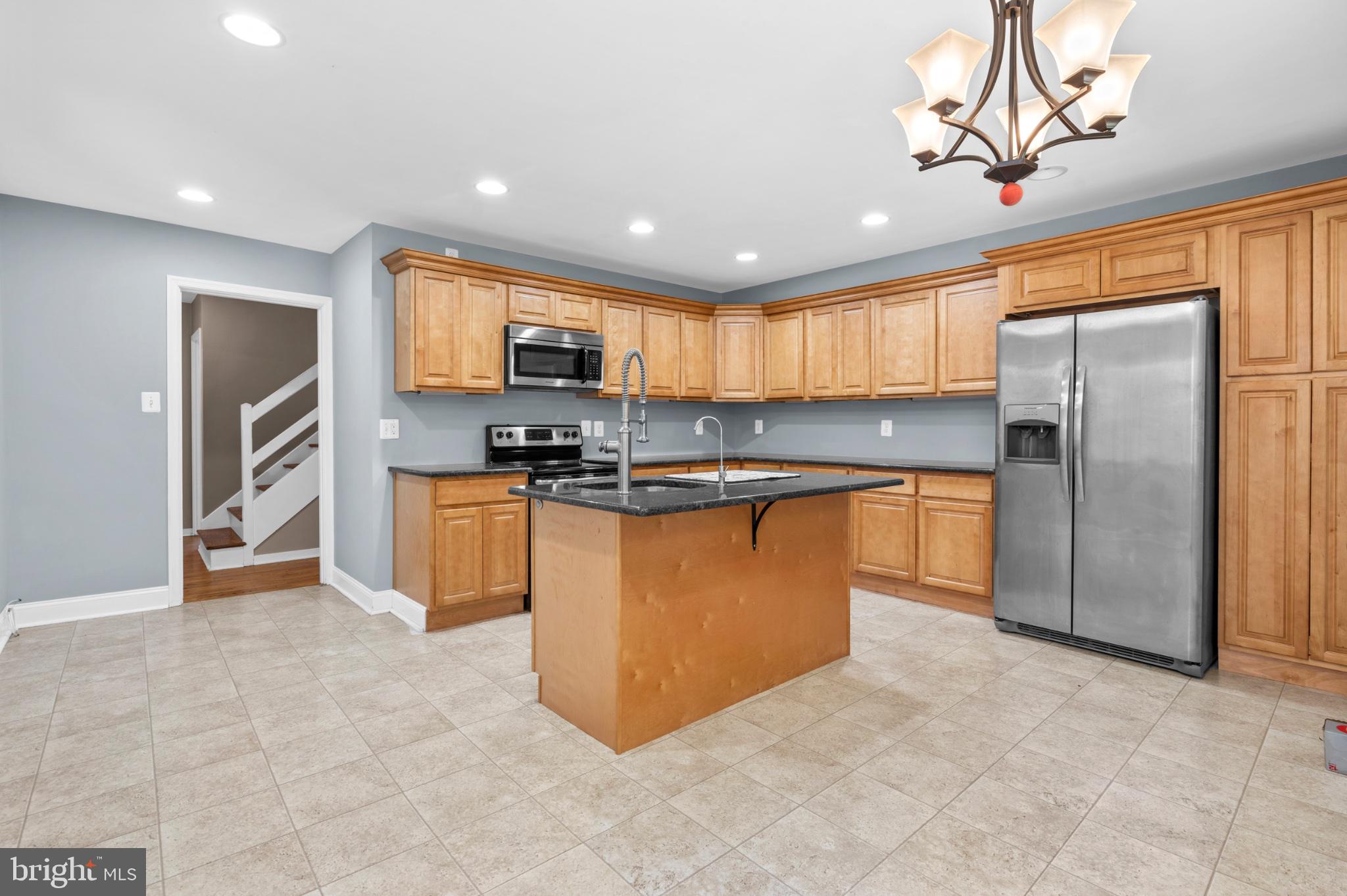1457 Meetinghouse Road Warminster, PA 18974 - Photo 8 of 30 Modern kitchen with warm wood tones.