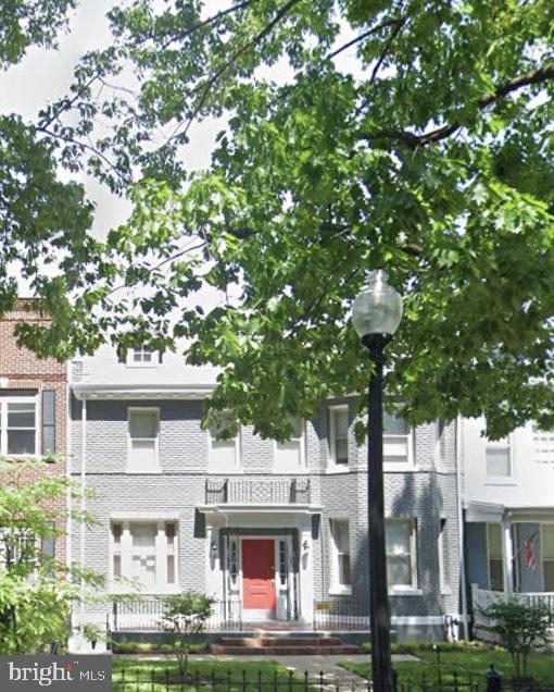 1224 Maryland Avenue Northeast, Unit 3 Washington, DC 20002 - Photo 1 of 12 a front view of a building with garden