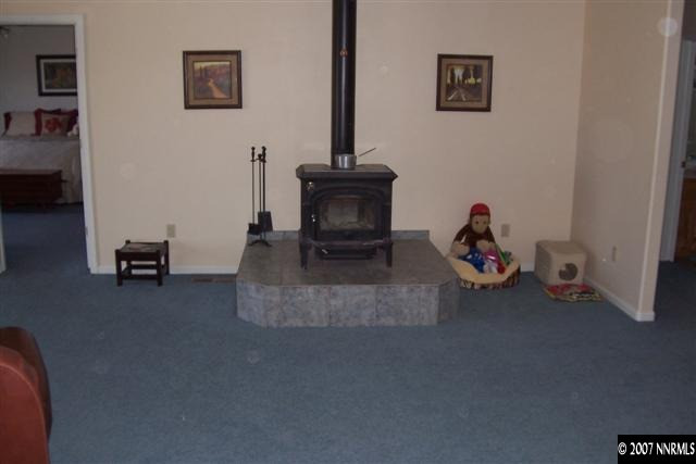 3200 Bacon Rind Road Reno, NV 89510 - Photo 5 of 9 a living room with furniture and a mirror