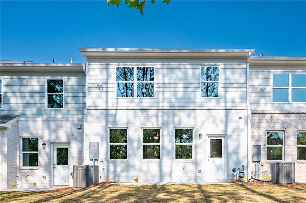 3744 Silvery Way Powder Springs, GA 30127 - Photo 26 of 26 a view of a building with a swimming pool
