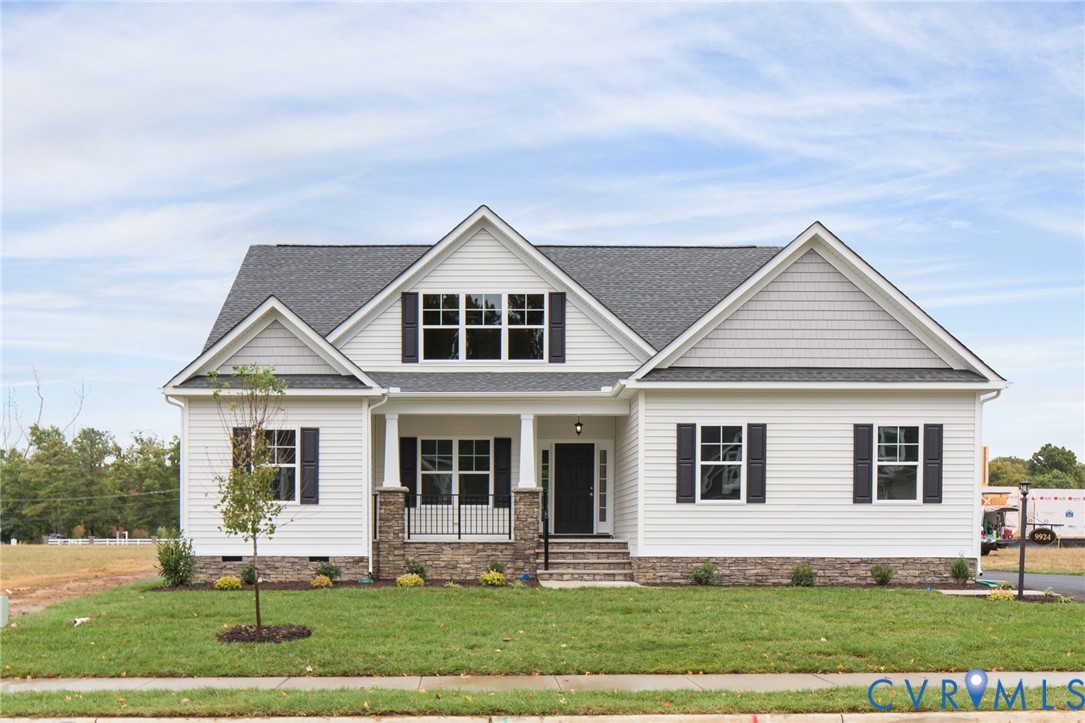 16851 Sheppards Fold Way Beaverdam, VA 23015 - Photo 2 of 33 a front view of a house with a yard