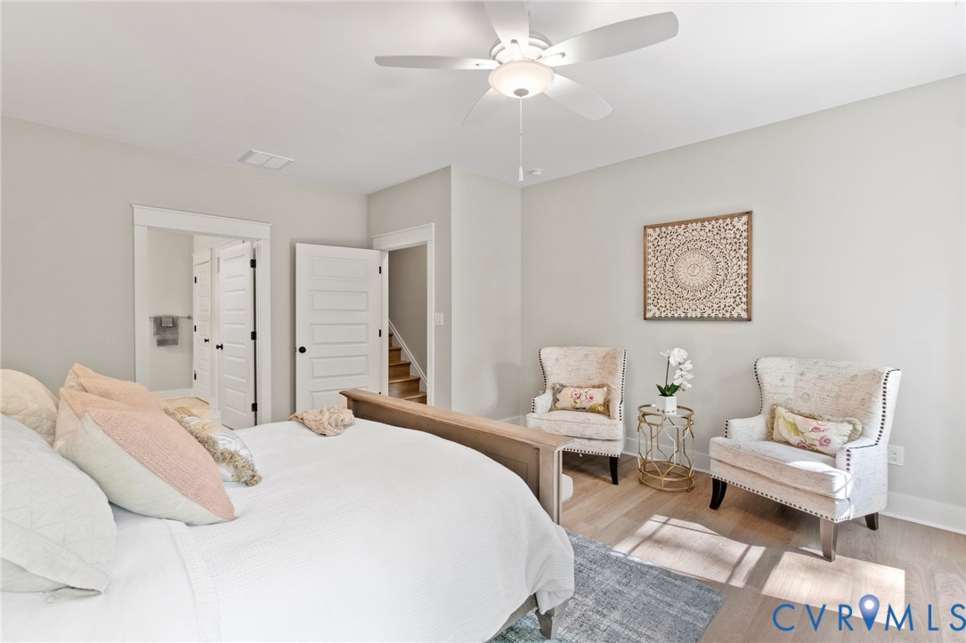 16851 Sheppards Fold Way Beaverdam, VA 23015 - Photo 22 of 33 a bedroom with a bed and a chandelier