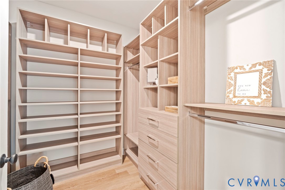 16851 Sheppards Fold Way Beaverdam, VA 23015 - Photo 25 of 33 a view of walk in closet with empty racks