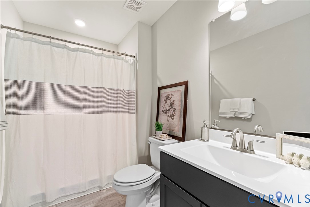 16851 Sheppards Fold Way Beaverdam, VA 23015 - Photo 28 of 33 a bathroom with a sink toilet and shower