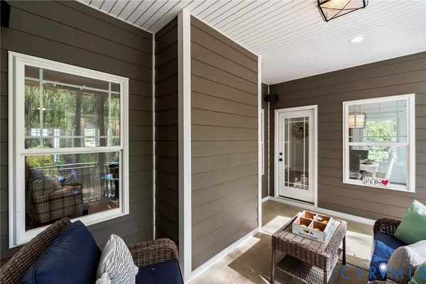 a outdoor living space with furniture and a window