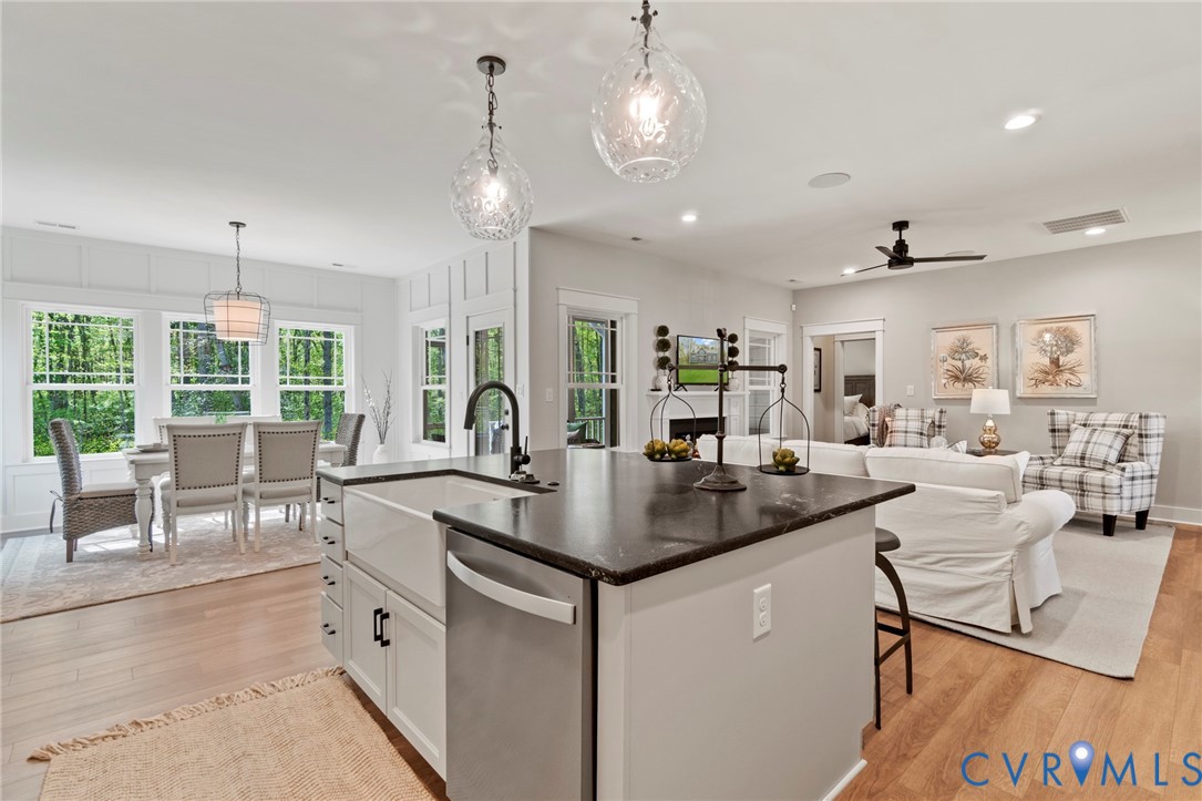 16851 Sheppards Fold Way Beaverdam, VA 23015 - Photo 6 of 33 a view of center island of a kitchen with granite countertop living room and living room