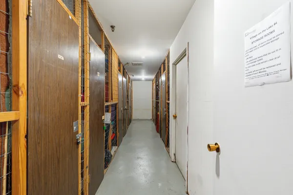 a view of hallway with a mirror
