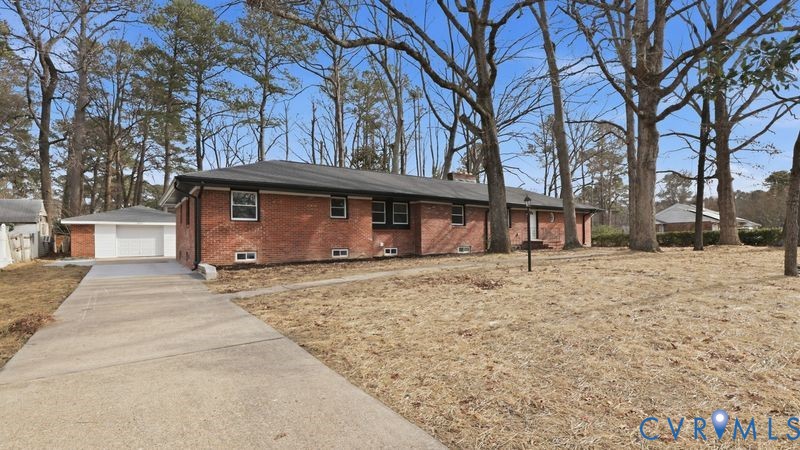2913 Rolyart Road Petersburg, VA 23805 - Photo 1 of 31 Ranch-style house featuring brick siding, a garage