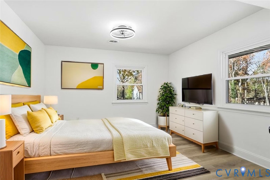 2913 Rolyart Road Petersburg, VA 23805 - Photo 14 of 31 Bedroom with light wood-style floors and baseboard