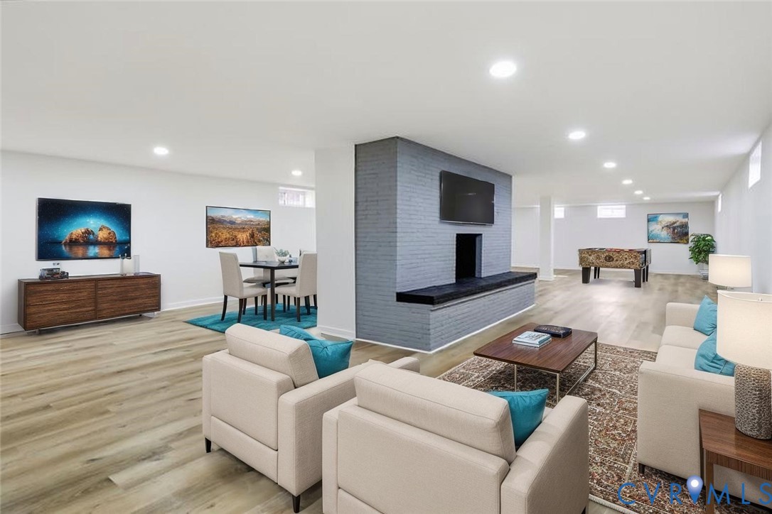 2913 Rolyart Road Petersburg, VA 23805 - Photo 18 of 31 Living room with light wood finished floors, a bri