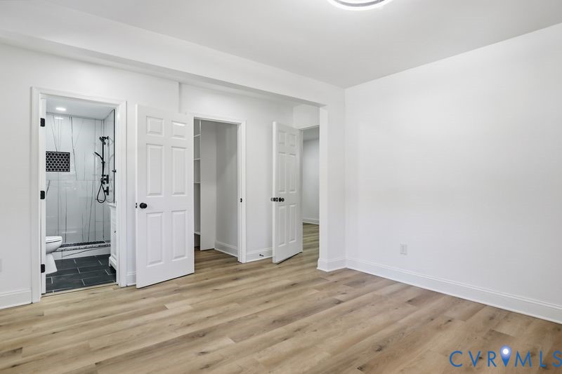 2913 Rolyart Road Petersburg, VA 23805 - Photo 27 of 31 Unfurnished bedroom featuring light wood-style flo