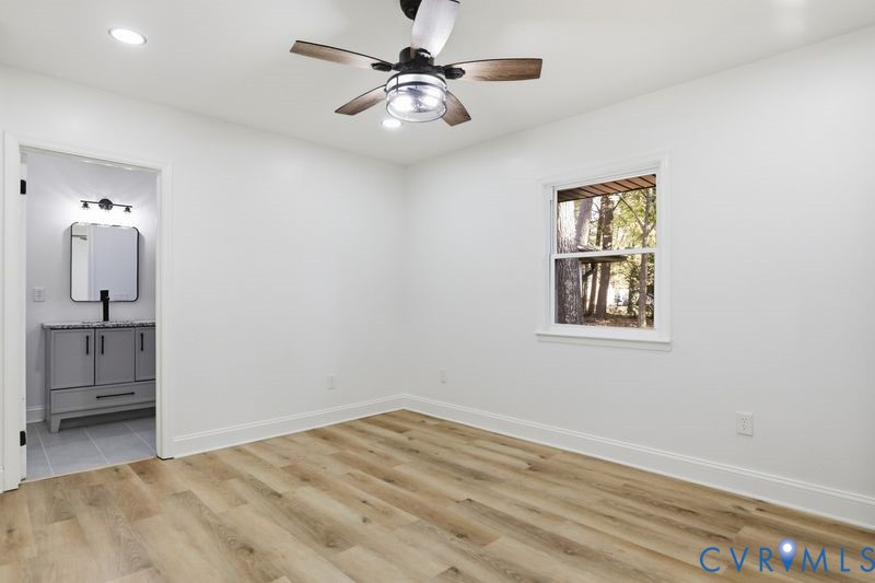 2913 Rolyart Road Petersburg, VA 23805 - Photo 30 of 31 Unfurnished bedroom featuring light wood-style flo