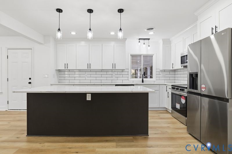 2913 Rolyart Road Petersburg, VA 23805 - Photo 8 of 31 Kitchen featuring stainless steel appliances, whit