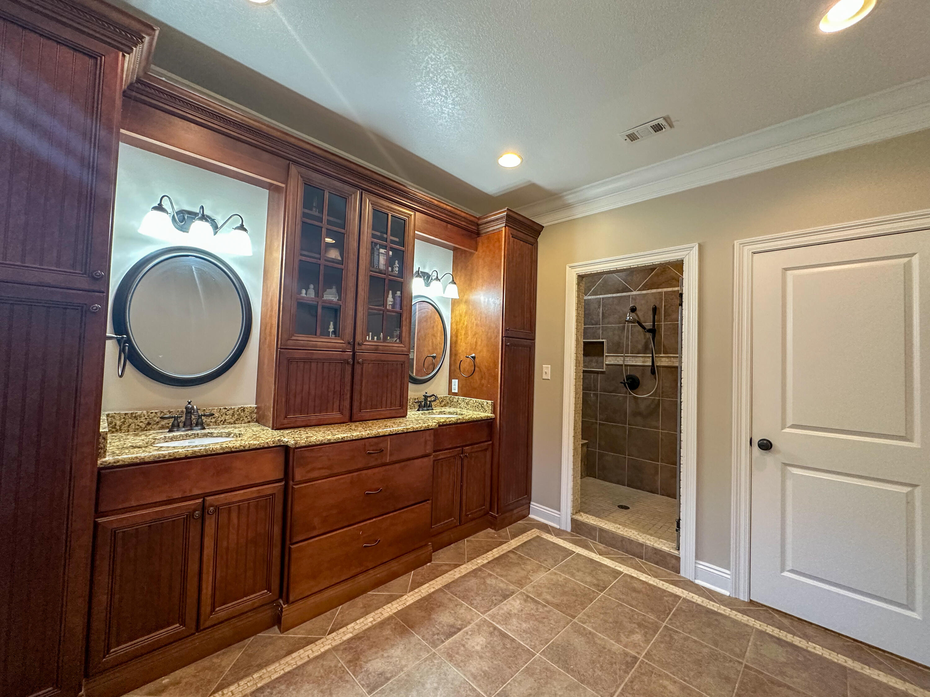 7935 Peacock Road Baker, FL 32531 - Photo 12 of 20 a view of a bathroom from the hallway