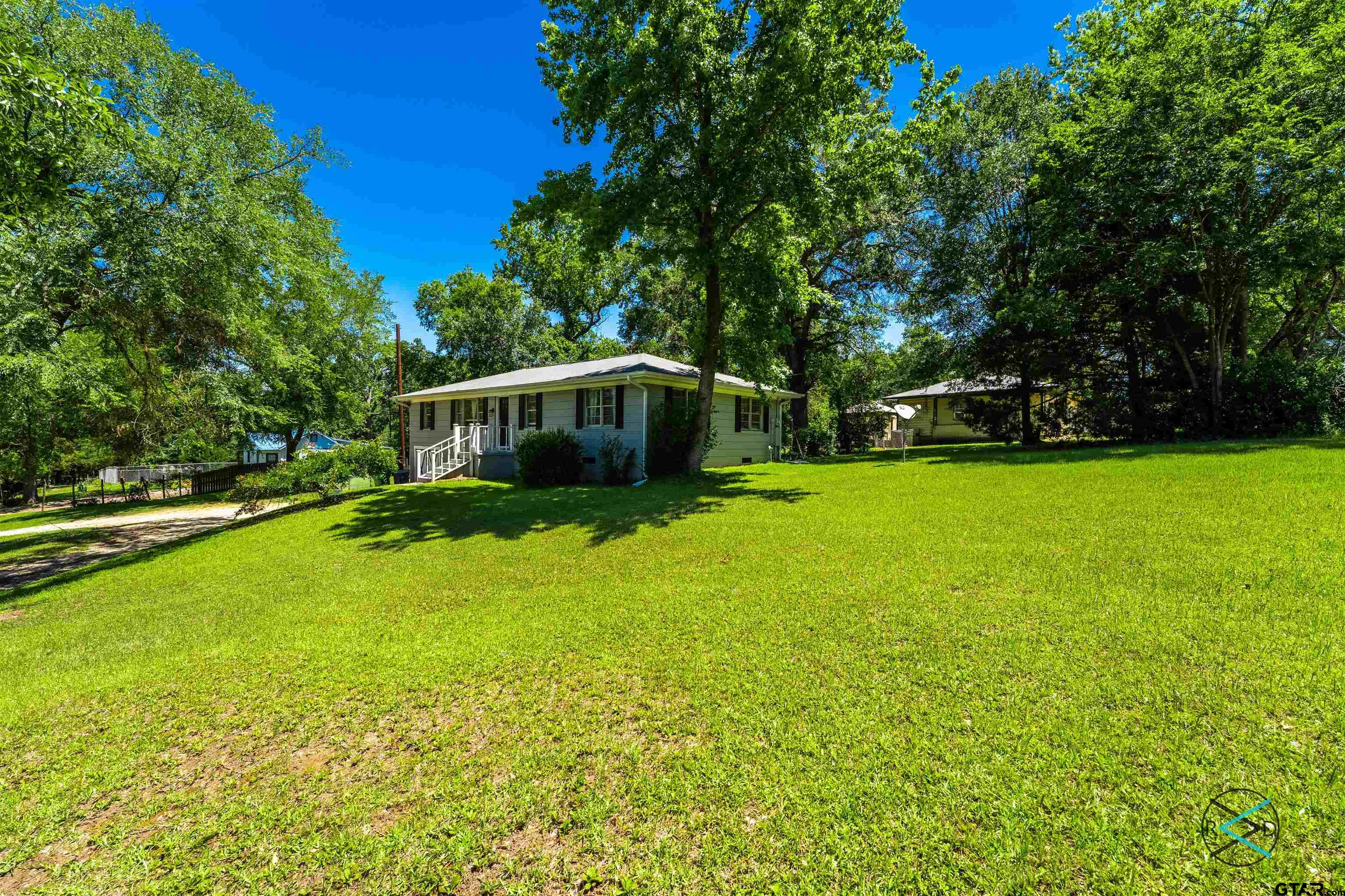 1506 Bassett Road Palestine, TX 75803 - Photo 18 of 18 a view of a house with a yard