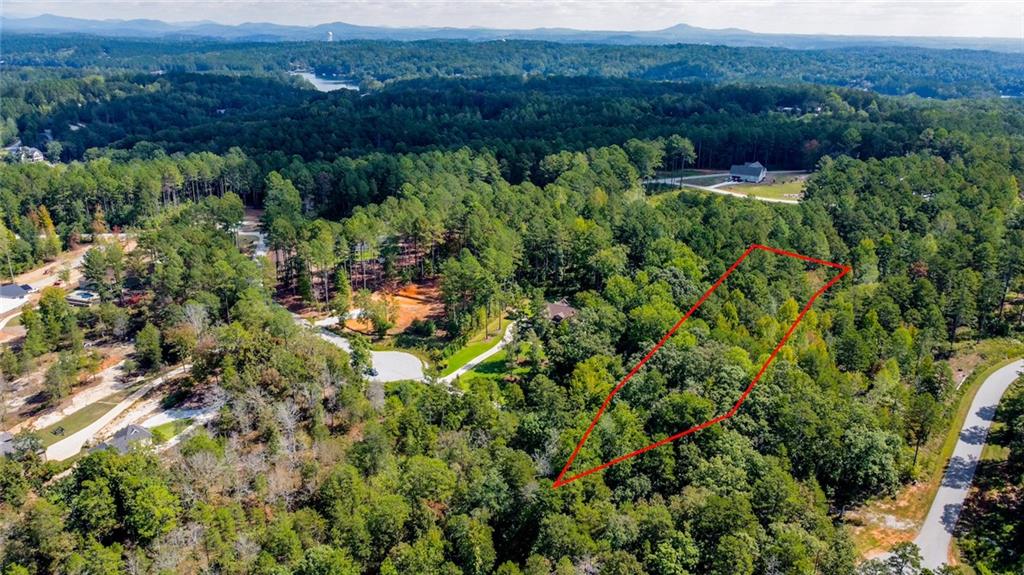 Lot 30 Harbor Point Seneca, SC 29672 - Photo 1 of 12 A verdant, sloped lot offers an opportunity to build within a tranquil, wooded setting.