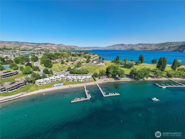 a view of a swimming pool with an outdoor seating