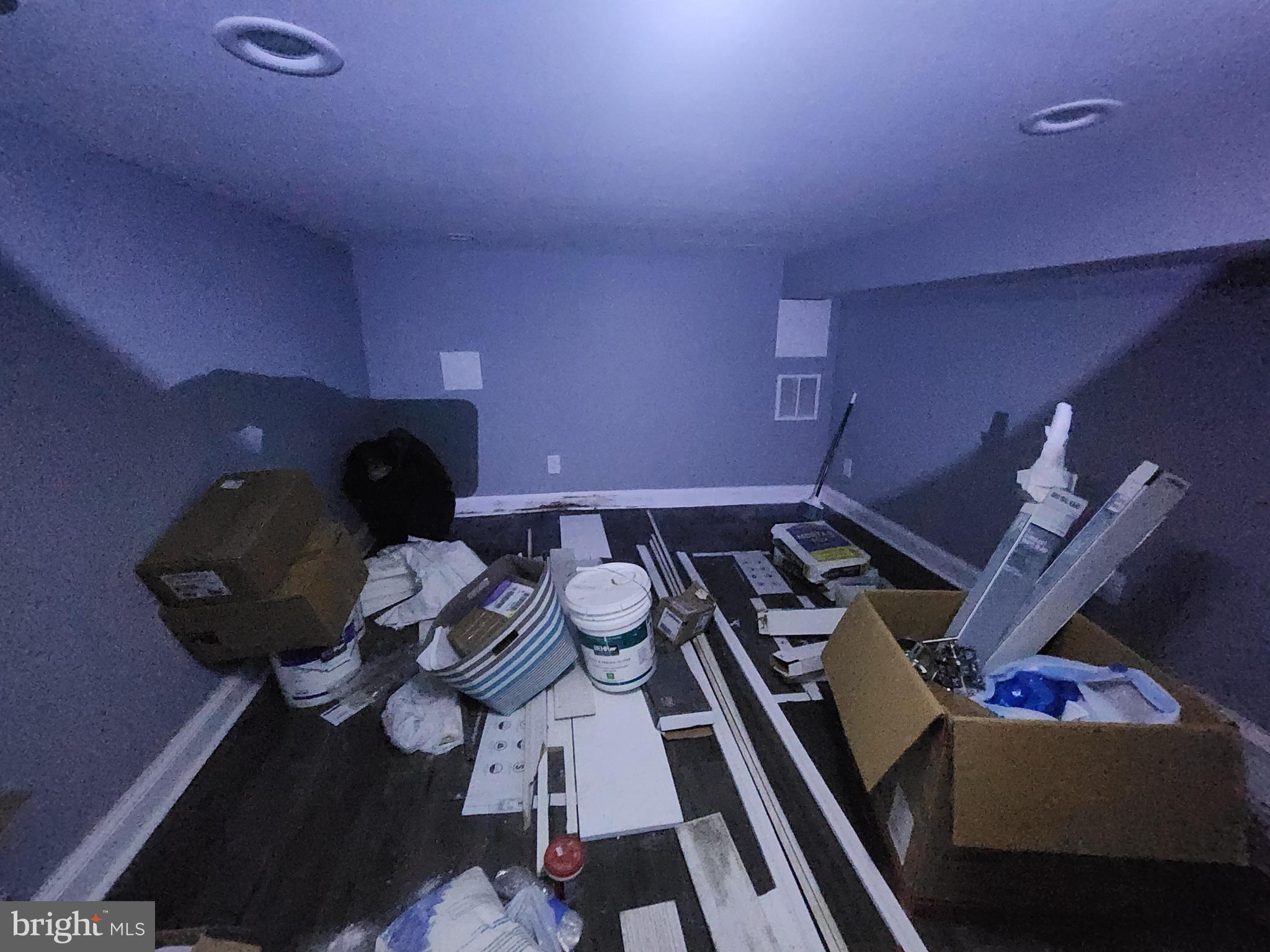 1629 Rutland Avenue Baltimore, MD 21213 - Photo 16 of 20 a living room with furniture and a rug