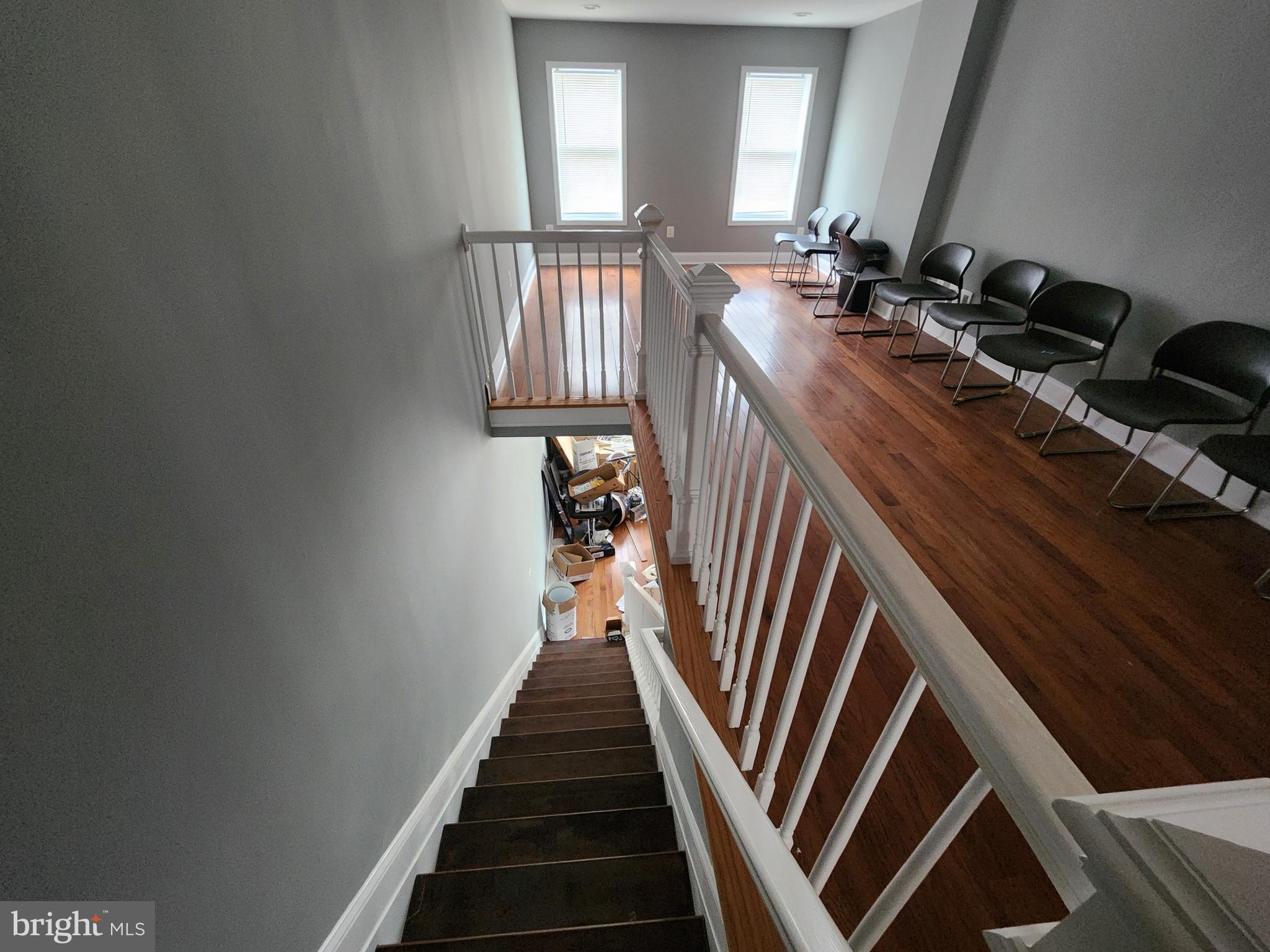 1629 Rutland Avenue Baltimore, MD 21213 - Photo 6 of 20 a view of entryway and hall with wooden floor