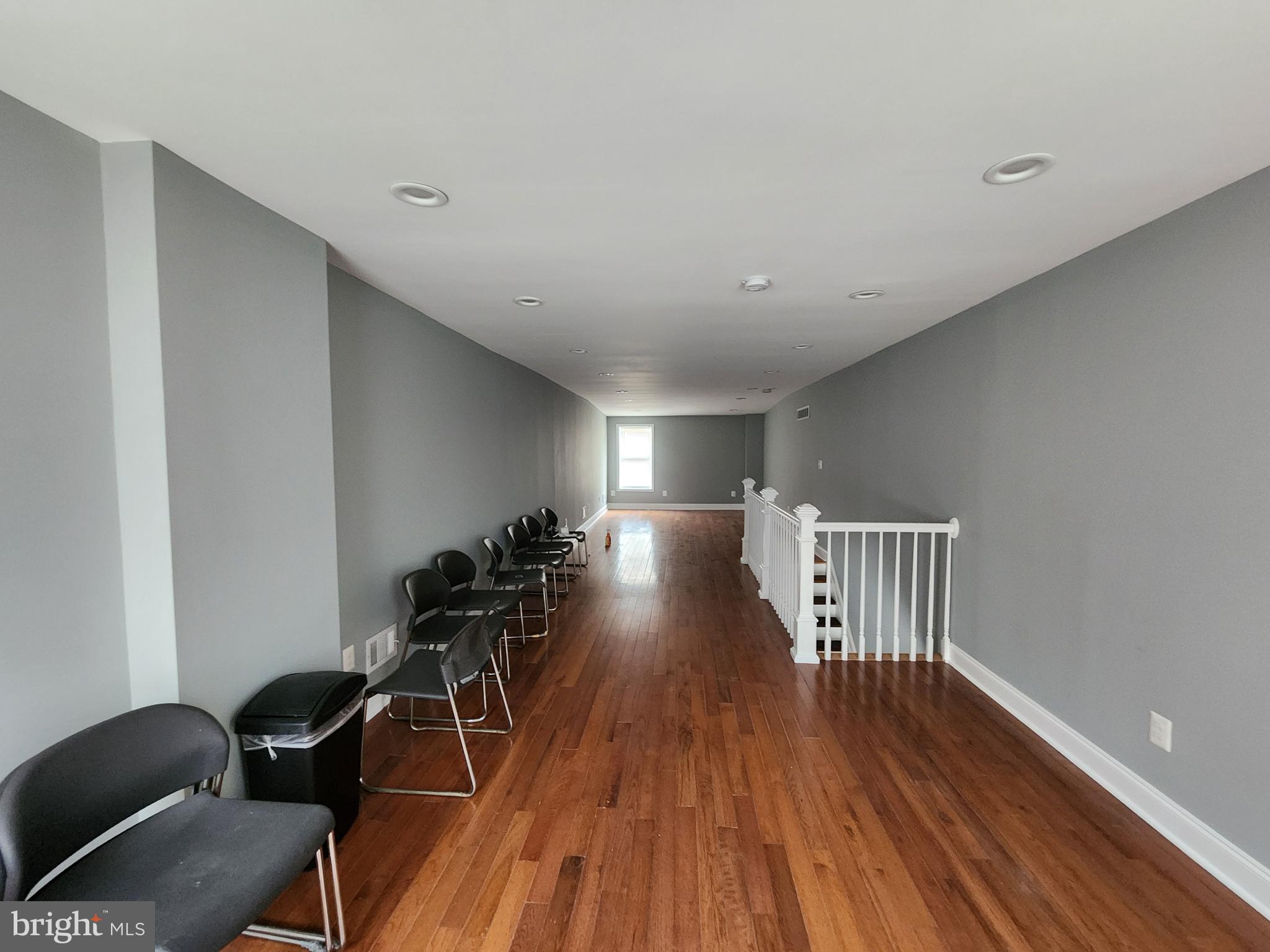 1629 Rutland Avenue Baltimore, MD 21213 - Photo 7 of 20 a view of a room with wooden floor