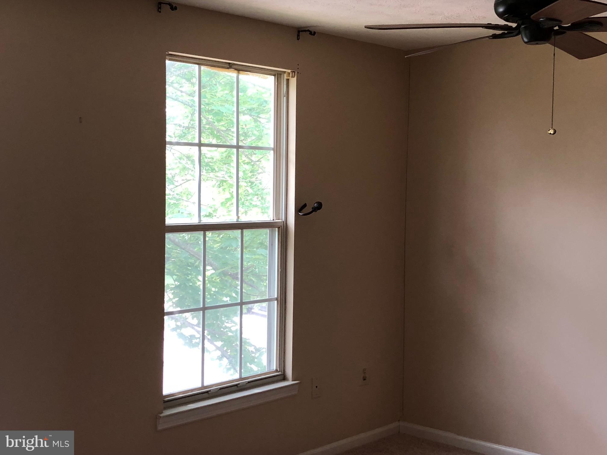 2212 Riding Crop Way Baltimore, MD 21244 - Photo 11 of 19 a view of a room that has a window in it
