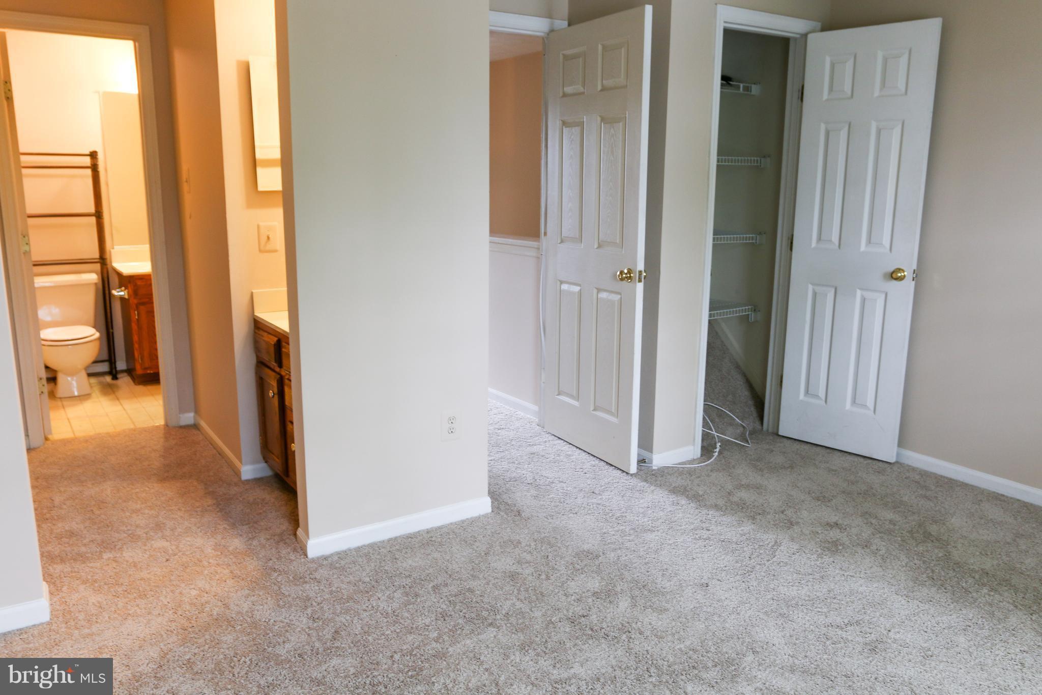 2212 Riding Crop Way Baltimore, MD 21244 - Photo 12 of 19 an empty room with windows