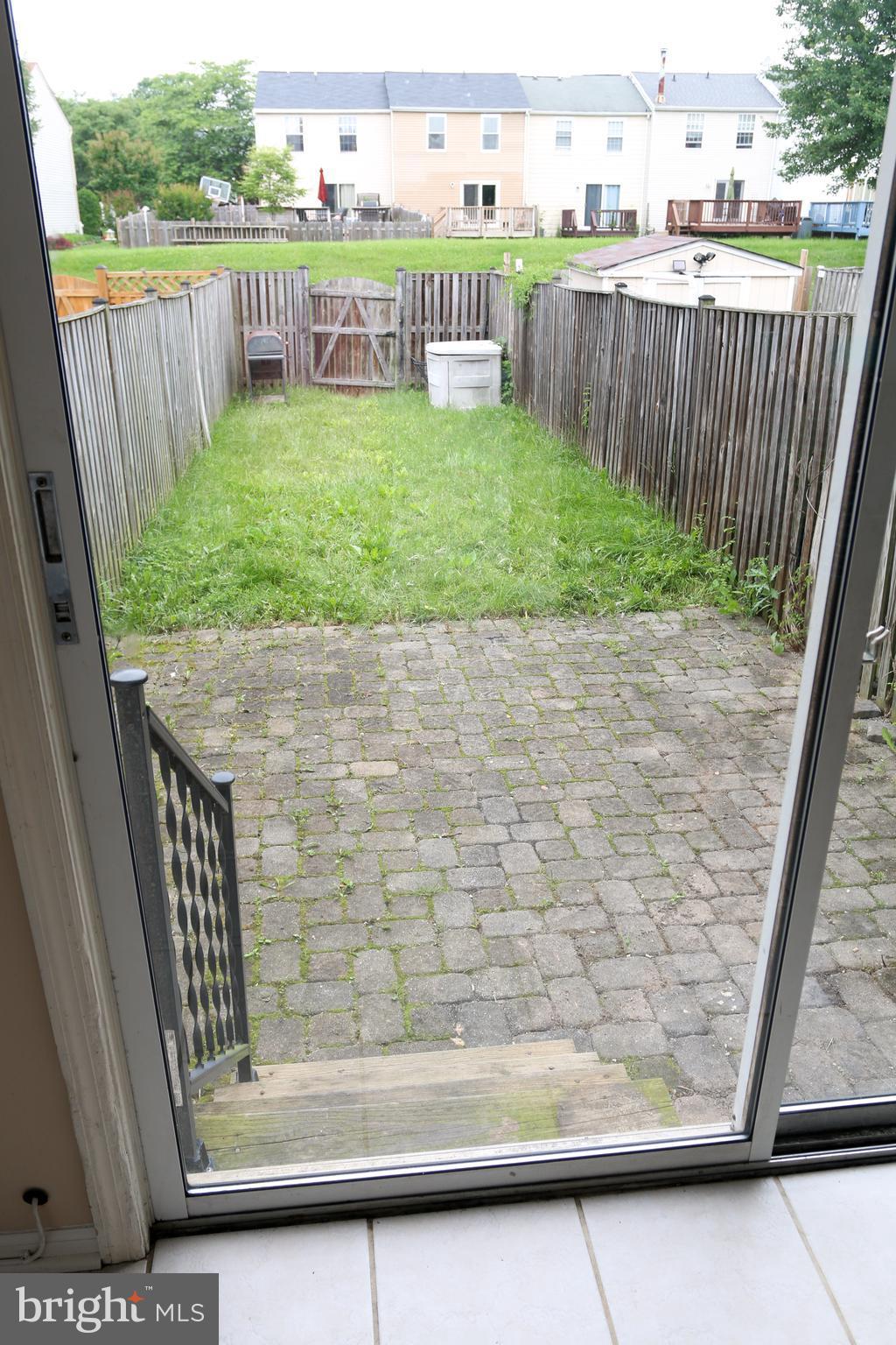 2212 Riding Crop Way Baltimore, MD 21244 - Photo 18 of 19 a view of a garden from a balcony