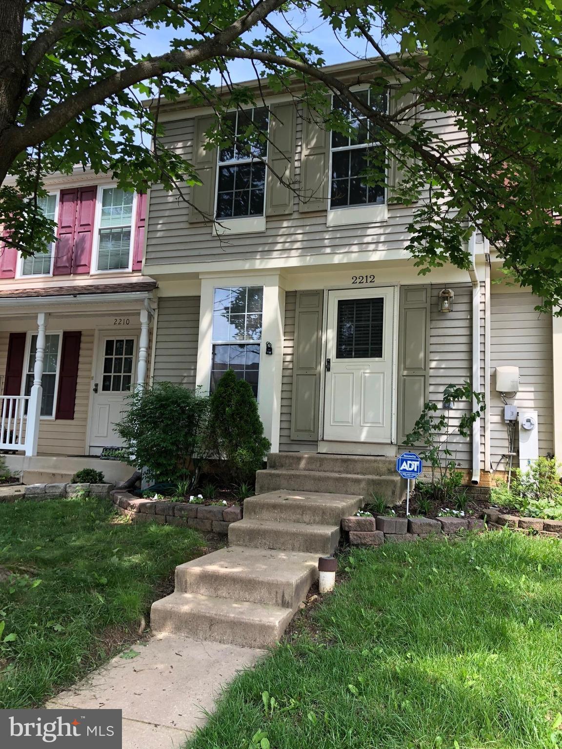 2212 Riding Crop Way Baltimore, MD 21244 - Photo 19 of 19 a front view of house with yard and green space