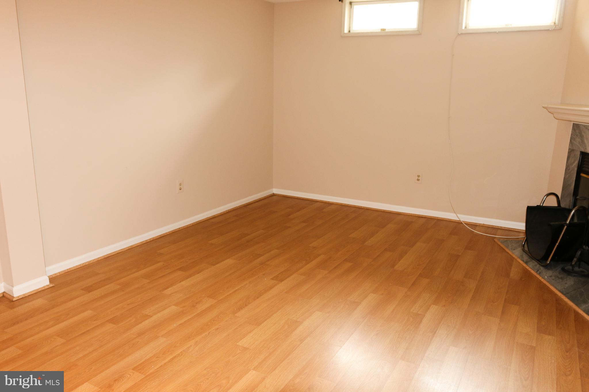 2212 Riding Crop Way Baltimore, MD 21244 - Photo 7 of 19 a view of small space with wooden floor