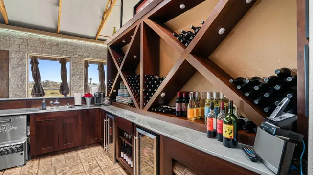 a view of a porch with furniture and front door
