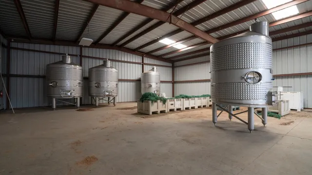 a view of residential houses with outdoor space and river