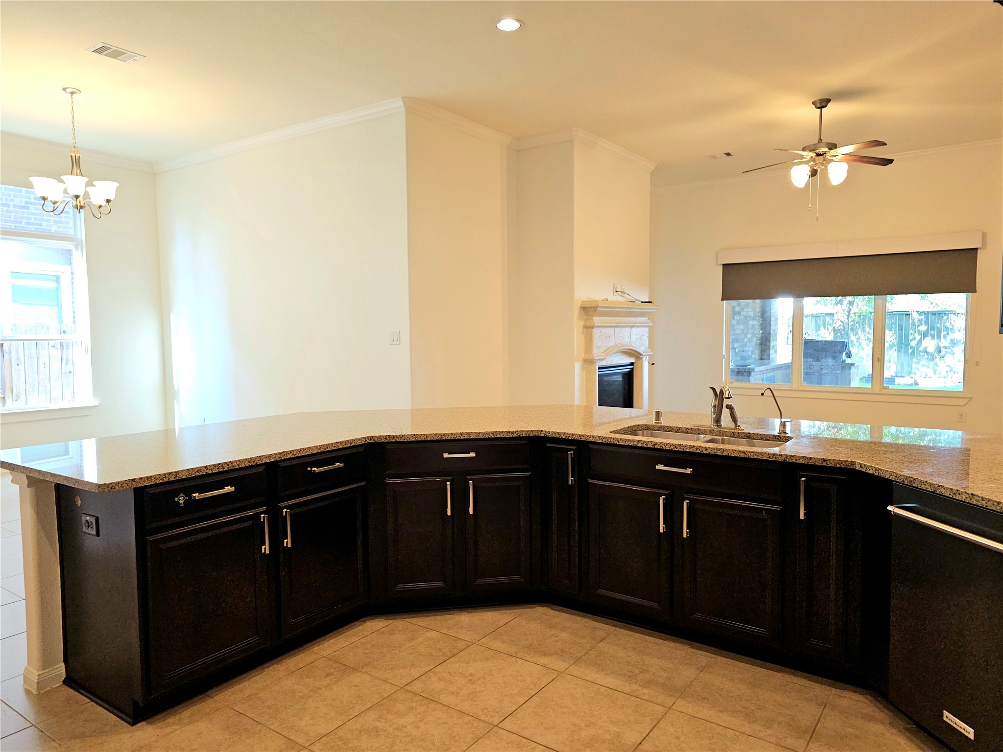 22106 Flashing Ridge Spring, TX 77389 - Photo 12 of 44 a kitchen with a sink and stove