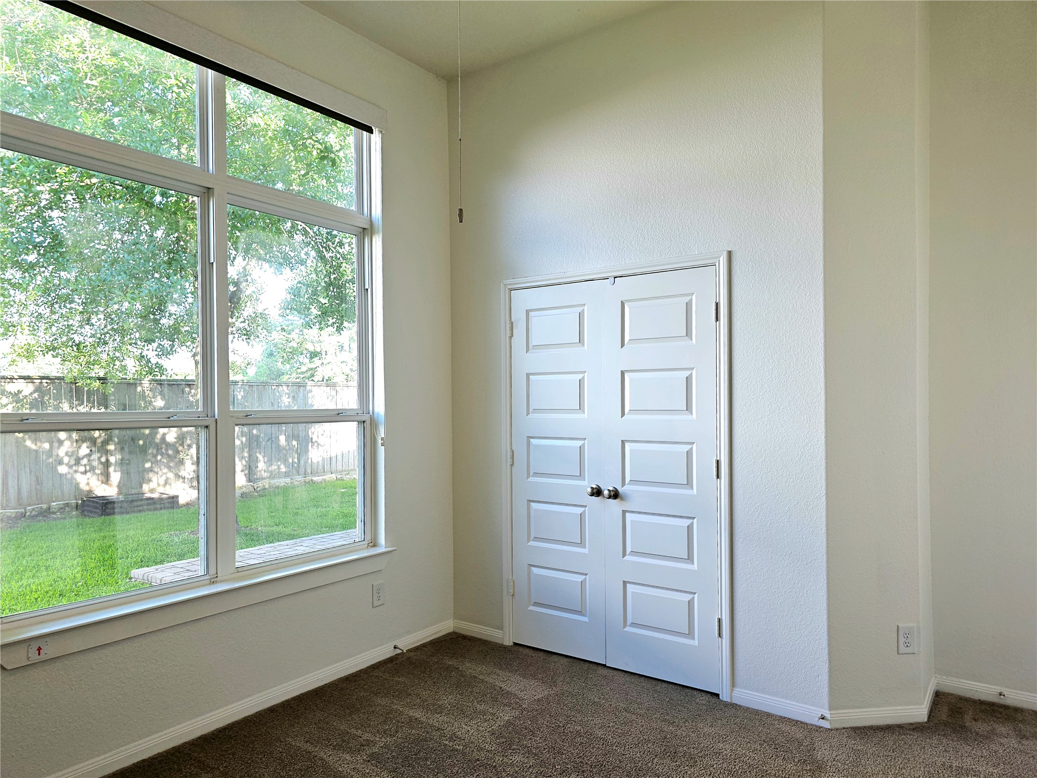 22106 Flashing Ridge Spring, TX 77389 - Photo 25 of 44 an empty room with windows and closet