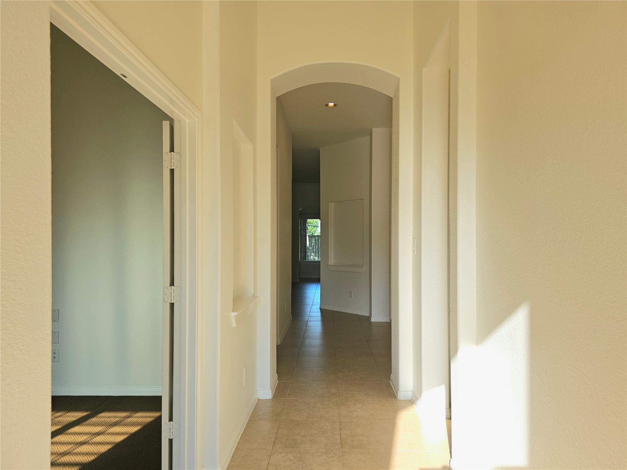 22106 Flashing Ridge Spring, TX 77389 - Photo 3 of 44 a view of a bathroom from a hallway